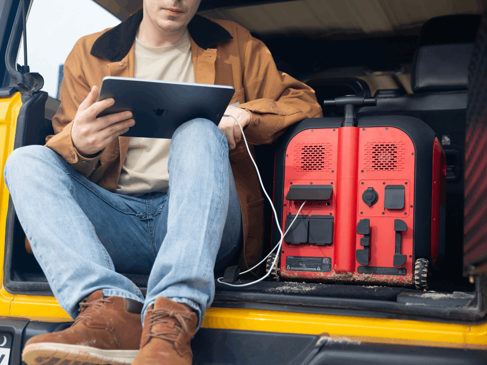 Devices charging at campsite